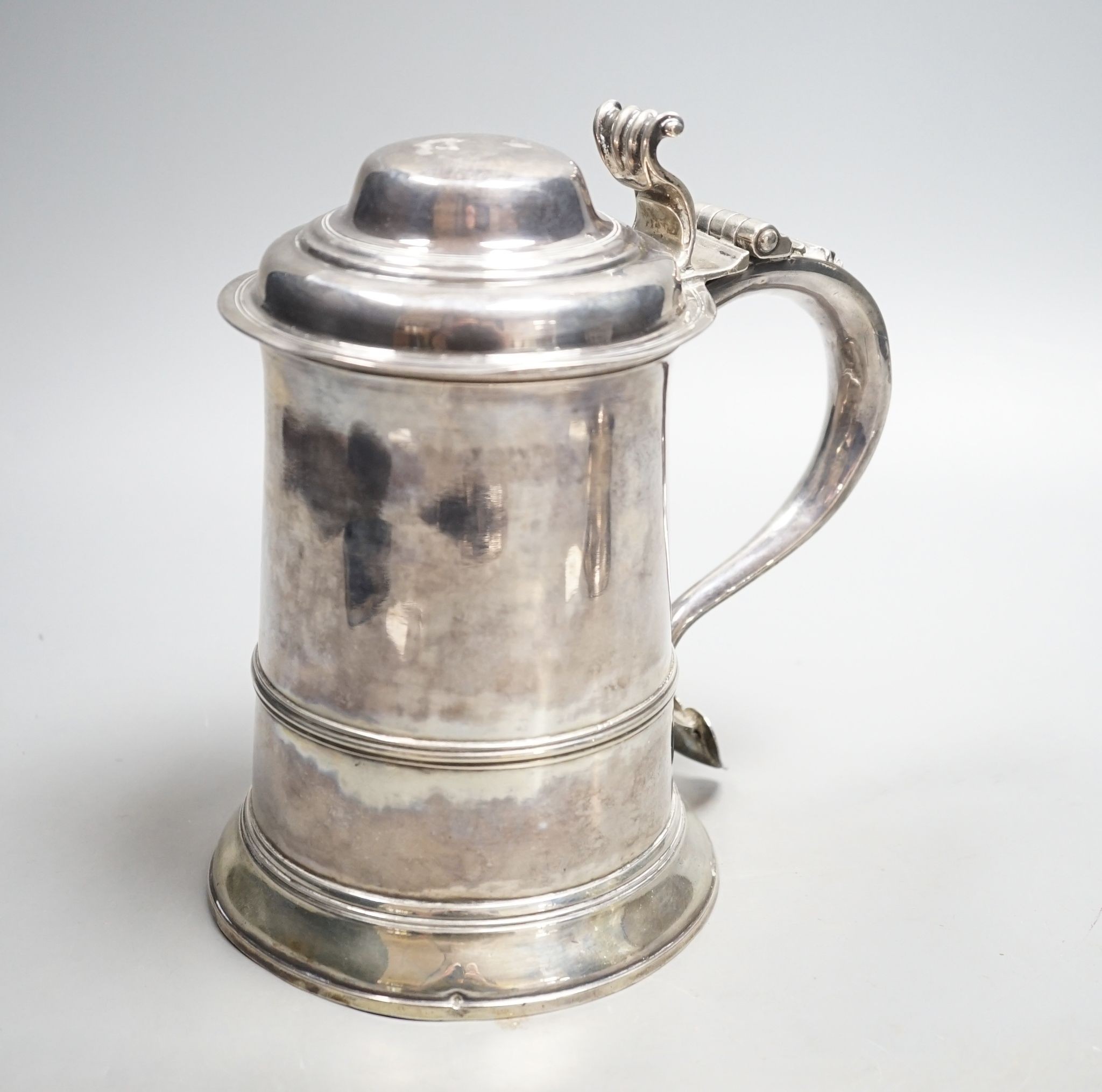 An early George III silver tankard, William & Robert Peaston, London,1763, height 18.9cm, 23oz (a.f.).